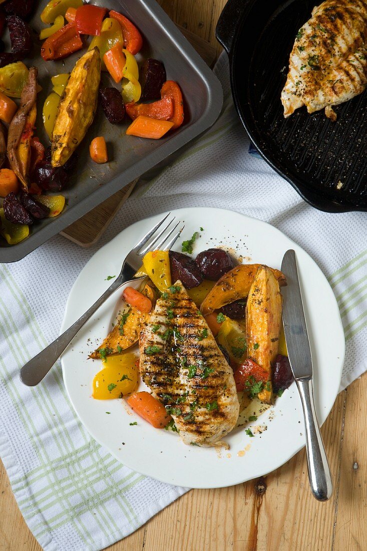 Grilled chicken breast and oven-roasted vegetables