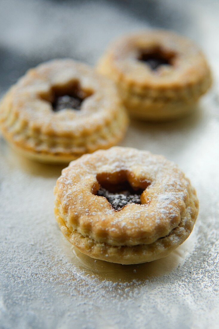 Mince pies on silver surface
