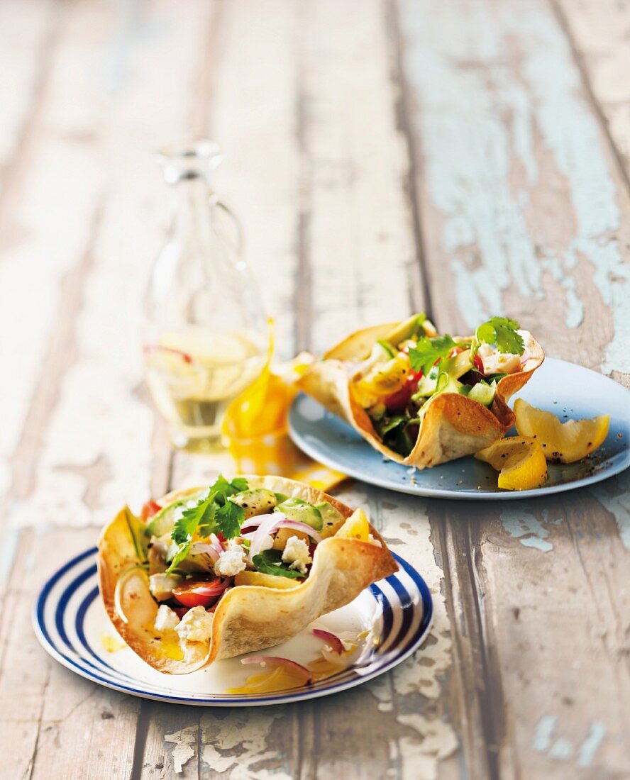 Salad with feta cheese in tortilla shells