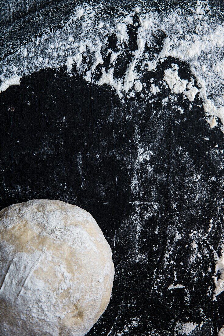 Bread dough on a floured work surface