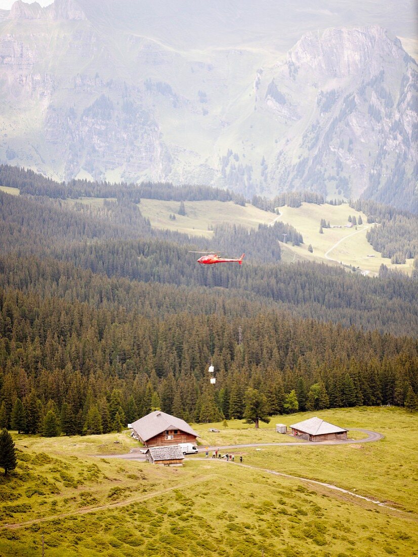 A helicopter supply the alps, Bernese Oberland, Switzerland