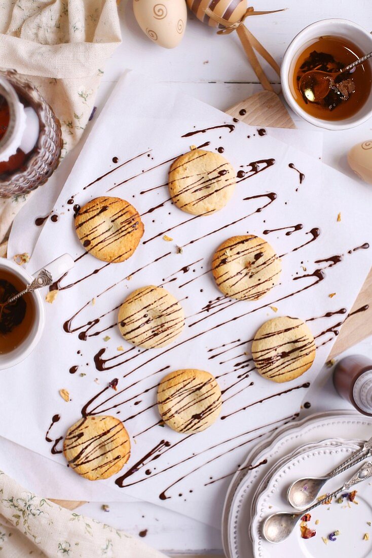 Coconut biscuits drizzled with chocolate sauce