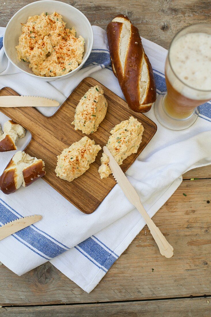 Obazter (Bavarian cheese spread), lye bread baguettes and beer