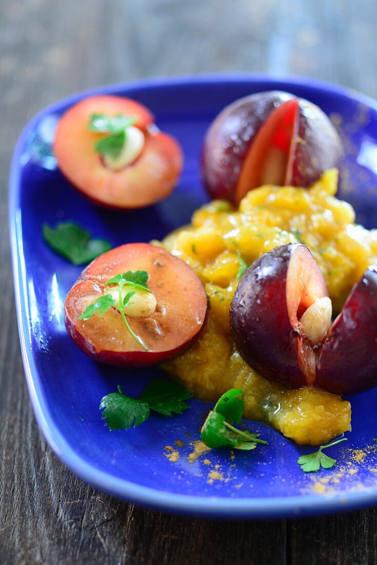 Plums in an apricot and ginger sauce