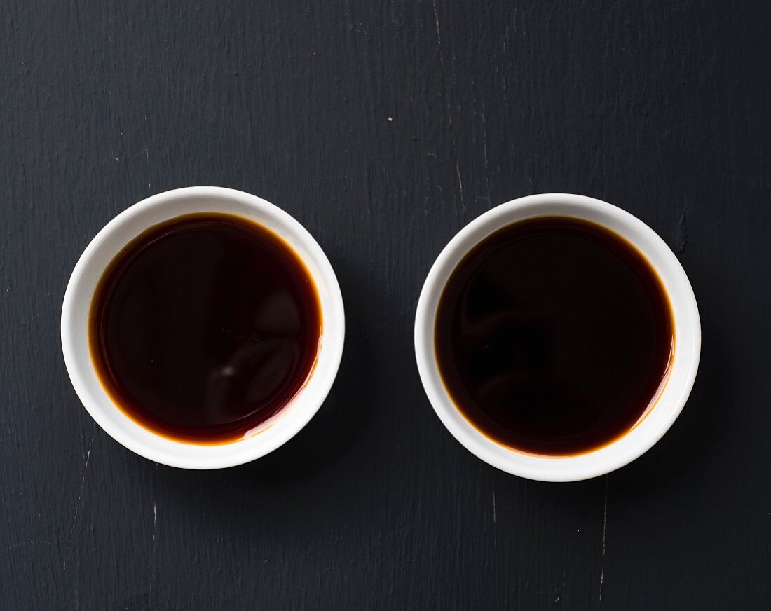 Soy sauce and tamari sauce in small bowls