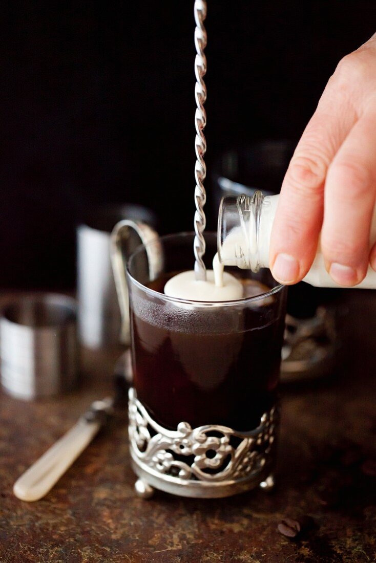 Black coffee with liqueur and cream