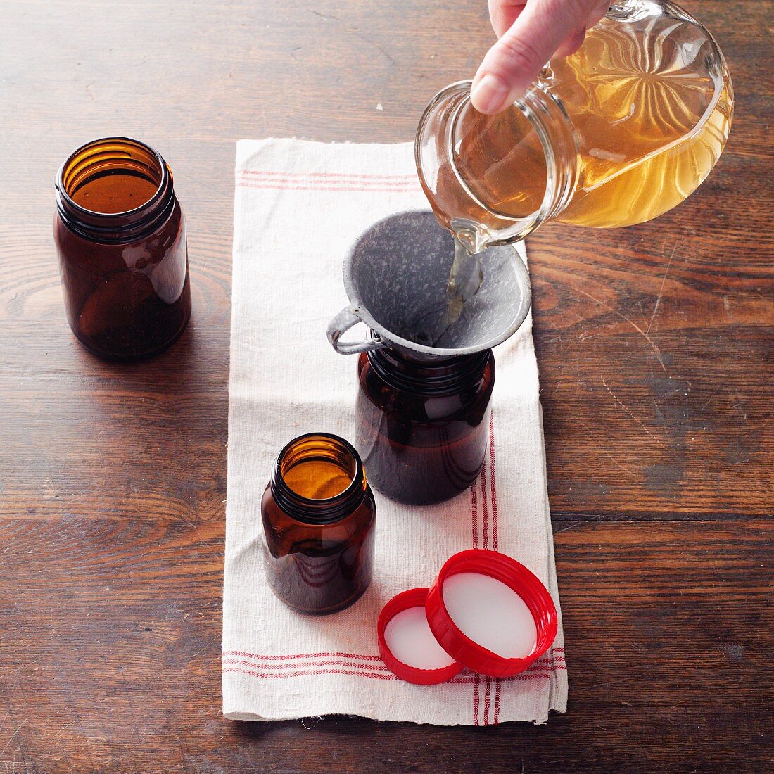 Lungwort decoction à la Hildegard being poured into bottles