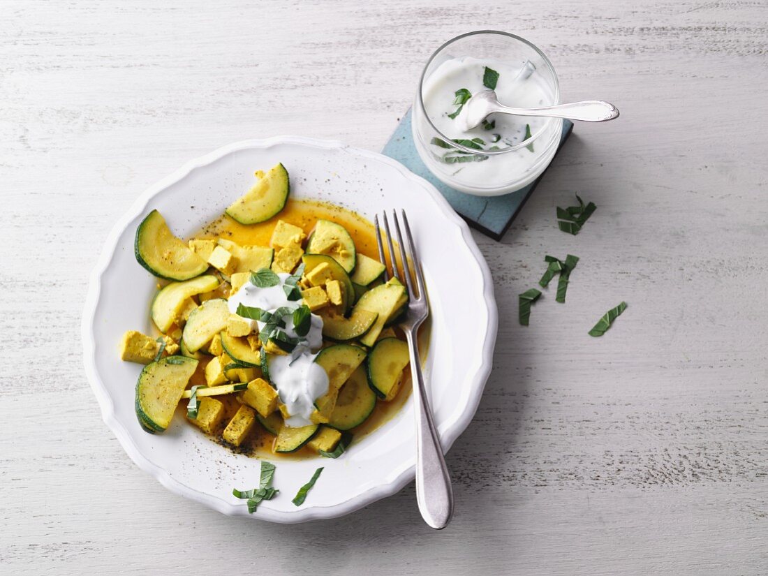 Courgette and tofu curry with natural yoghurt