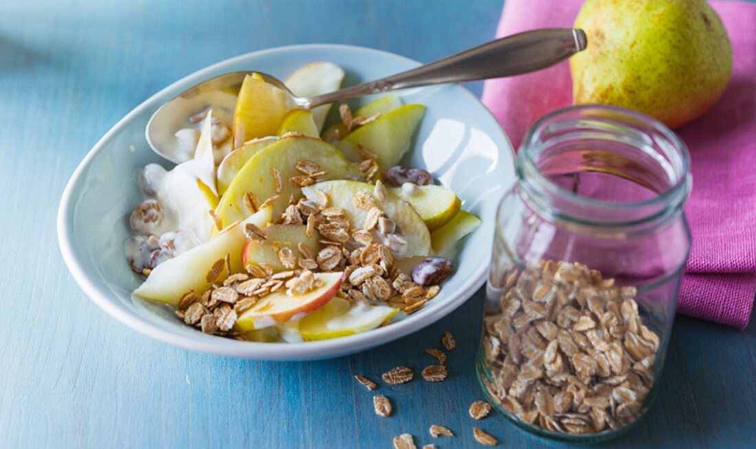 Apple and pear muesli with soya yoghurt and wheat flakes
