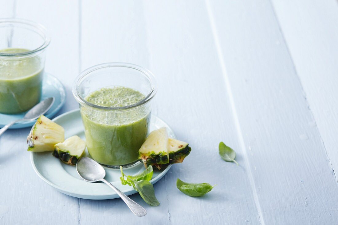 Pineapple and stinging nettle smoothie with coconut water and basil