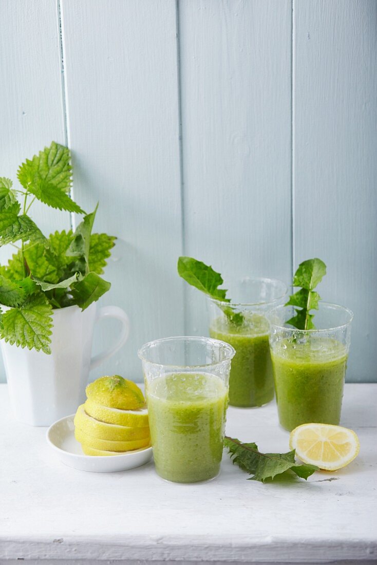 Stinging nettle and dandelion smoothies with ginger and lemon
