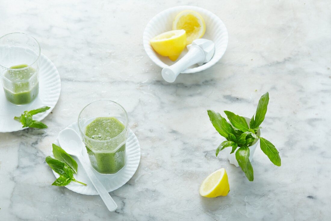 Green smoothies with basil and lemon