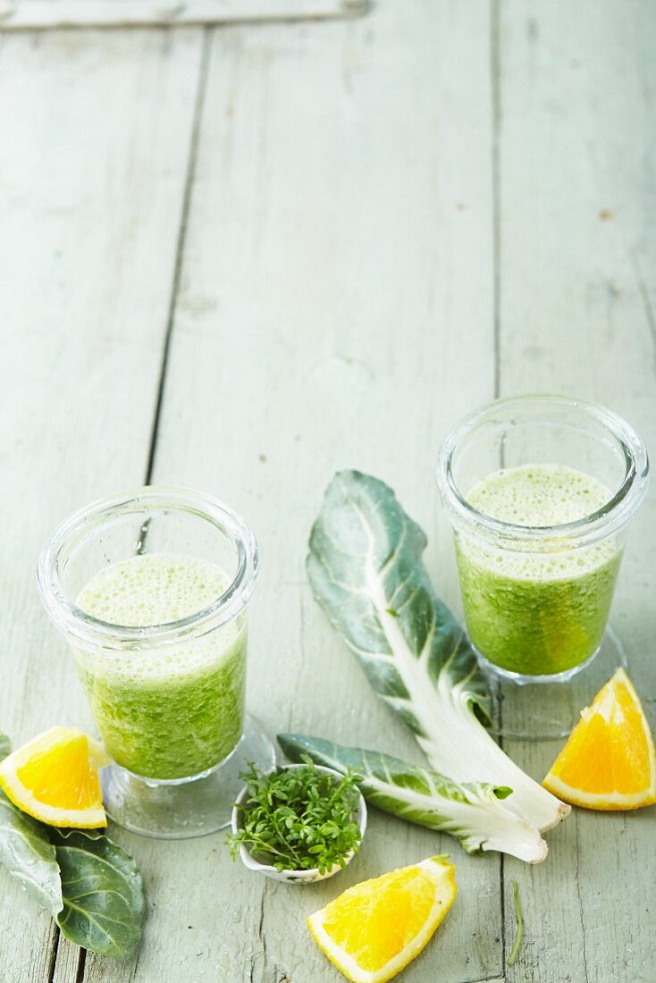 Chard and orange smoothies with green tea and cress