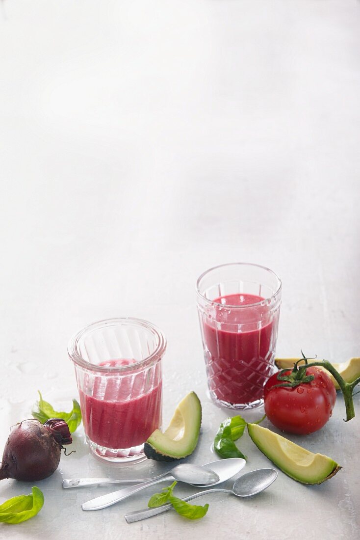 Tomato and avocado smoothies with beetroot and basil