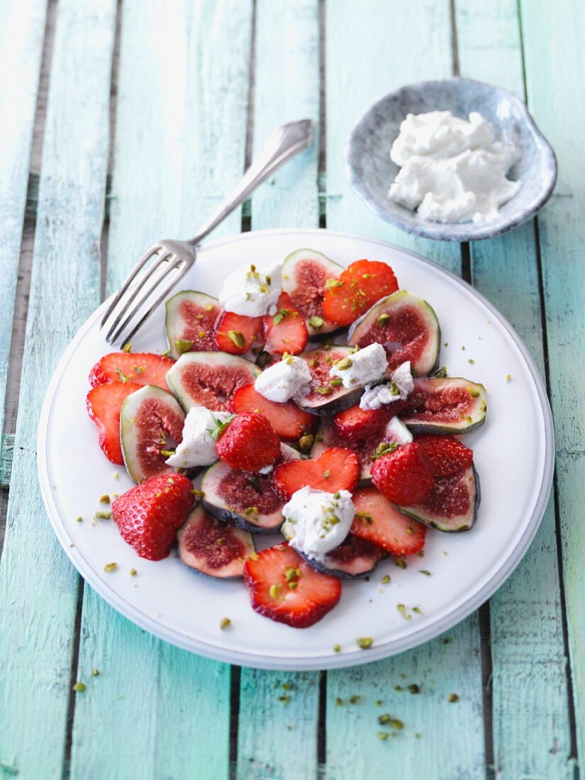 Fig an strawberry carpaccio with ricotta