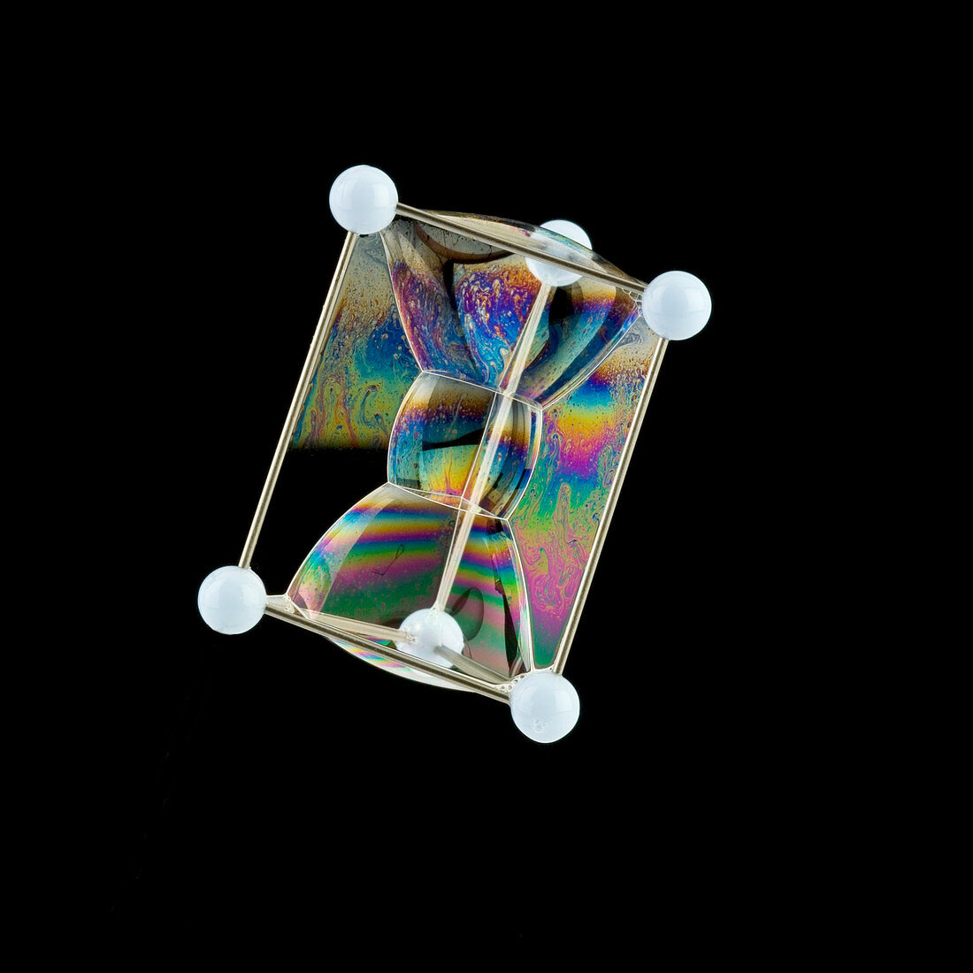 Soap bubbles on a triangular prism frame