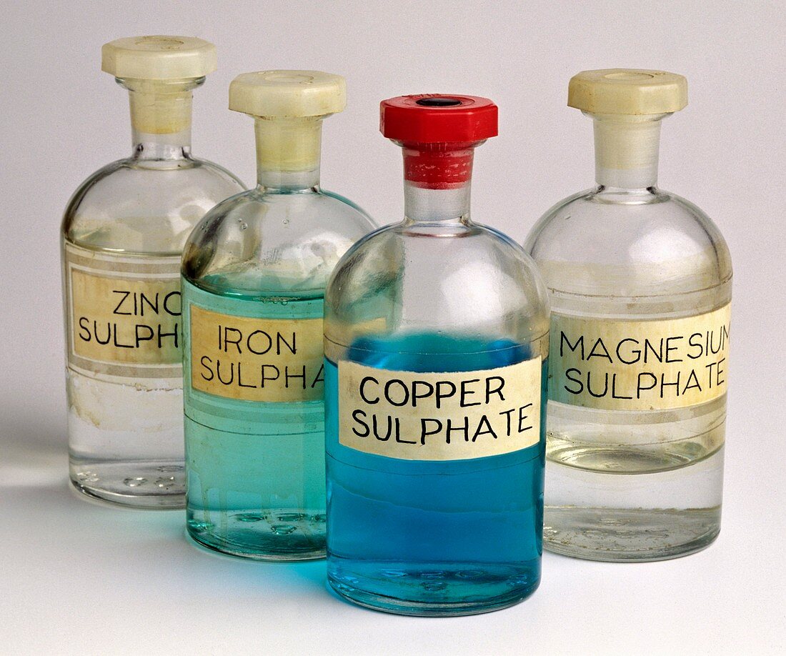 Four bottles of sulphate solutions