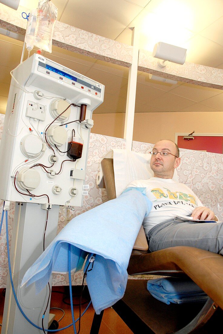 Man donating blood plasma