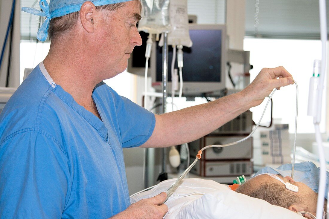 Anaesthetist monitoring a patient