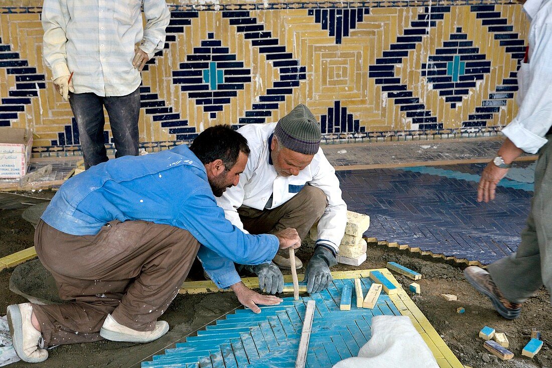 Laying a mosaic floor,Iran