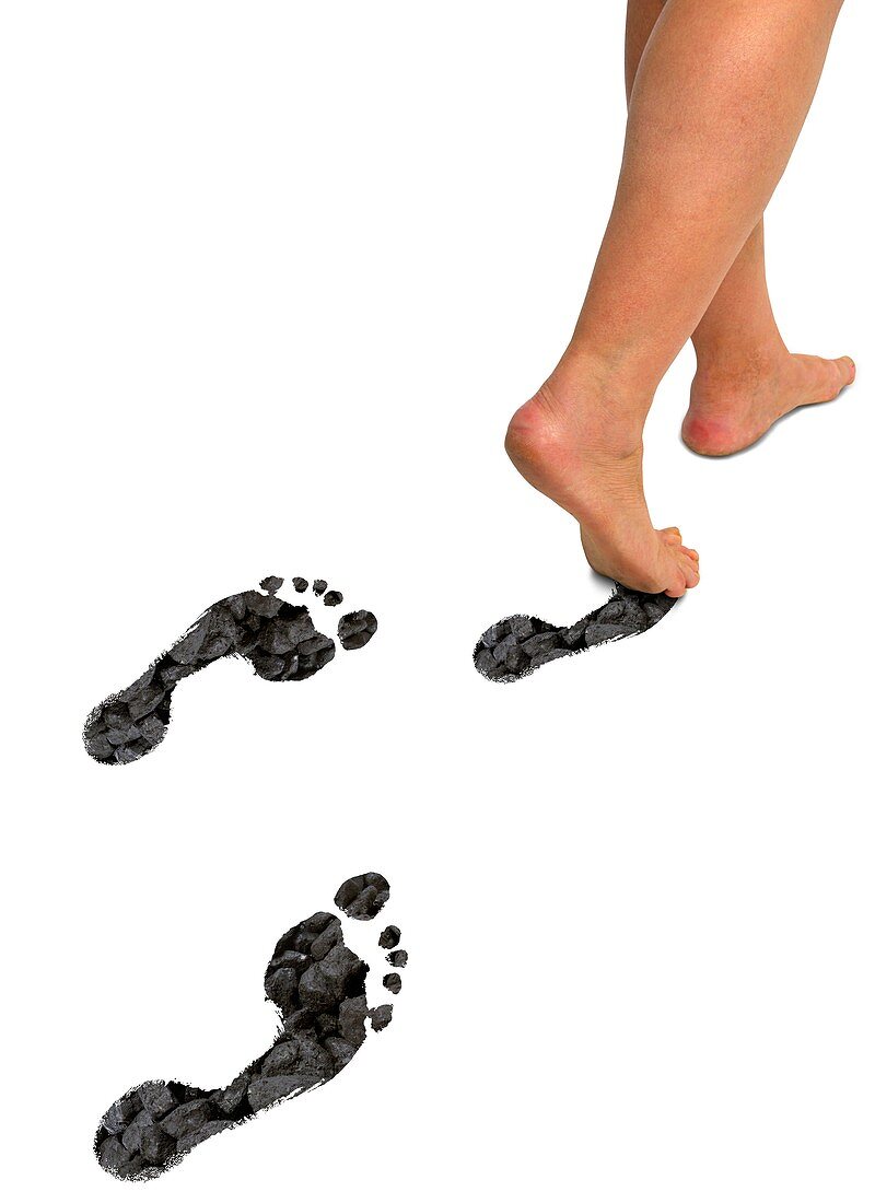 A woman's feet leaving carbon footprints