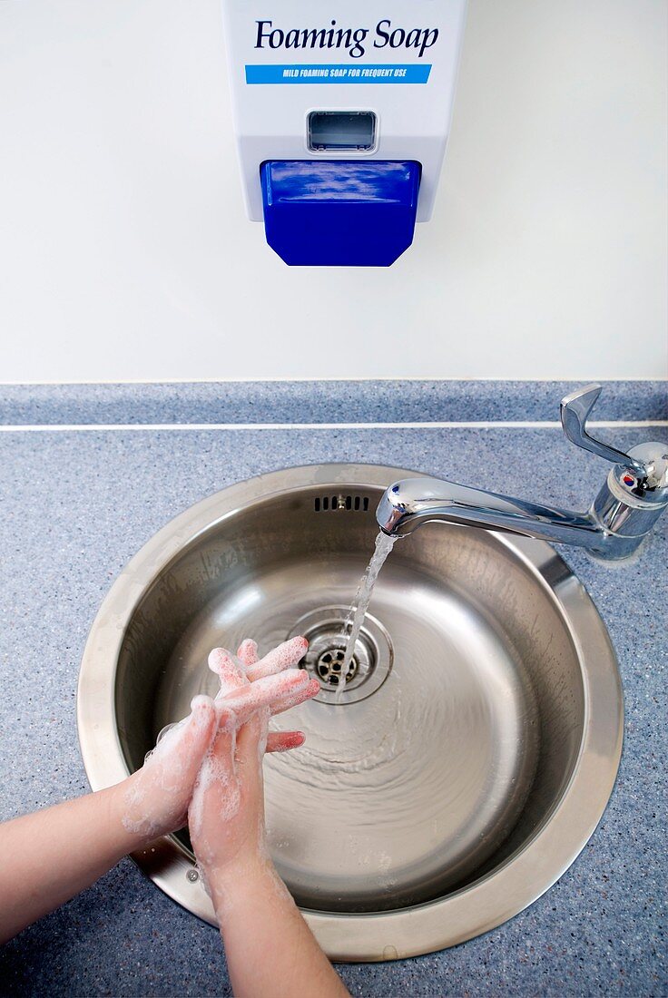 Person washing hands