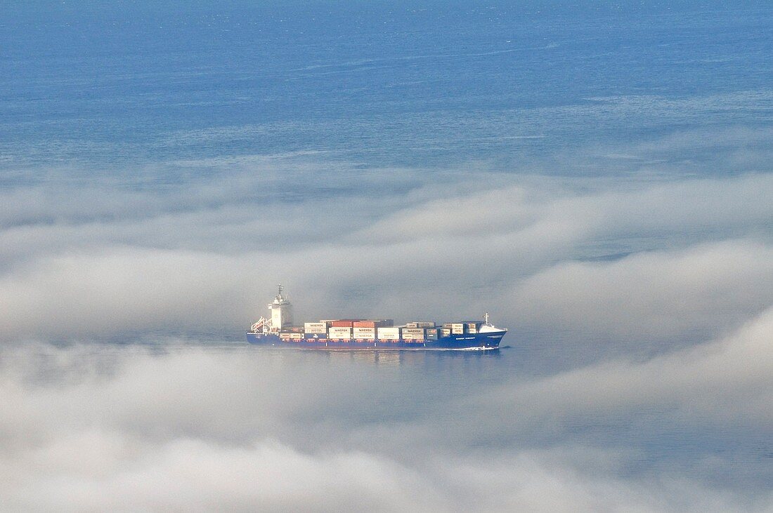 Container ship in fog