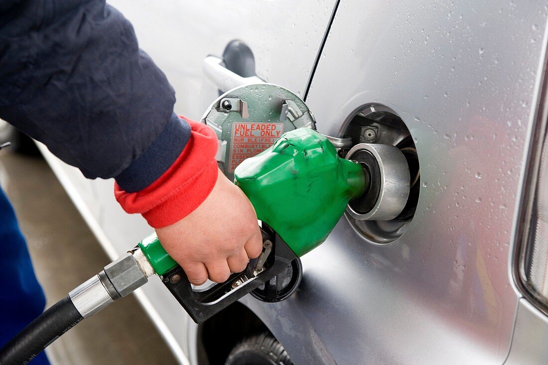 Motorist filling his petrol tank