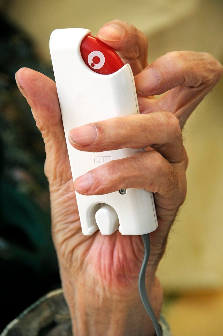Hospital patient uses handheld alarm