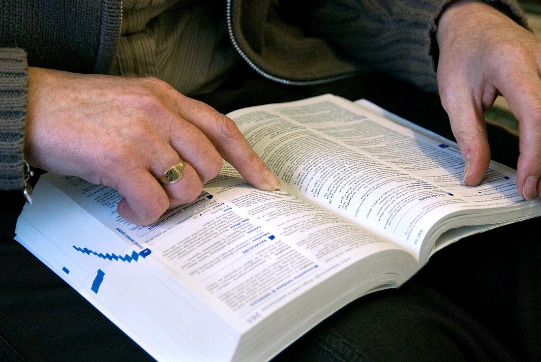 Nurse checking prescription information