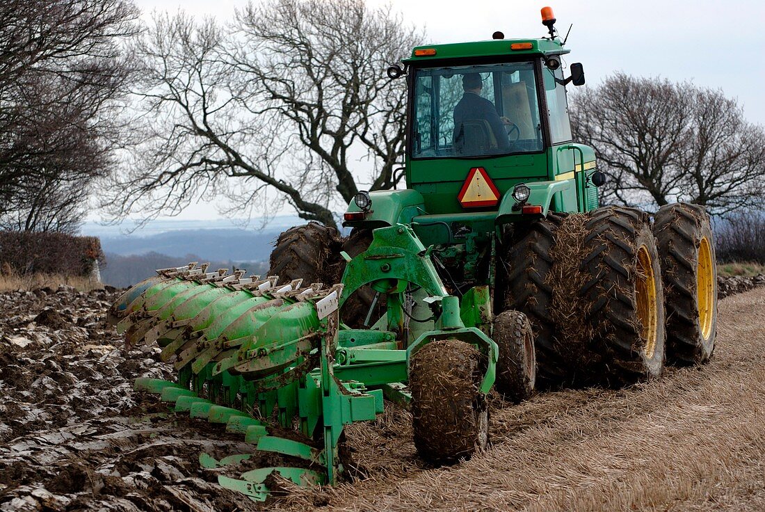 John Deere 8430 tractor ploughing