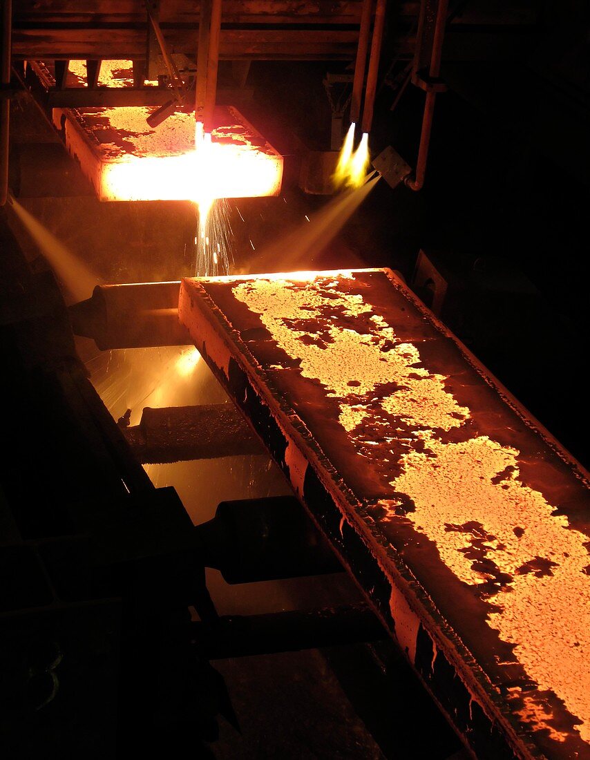 Molten steel bars being cut