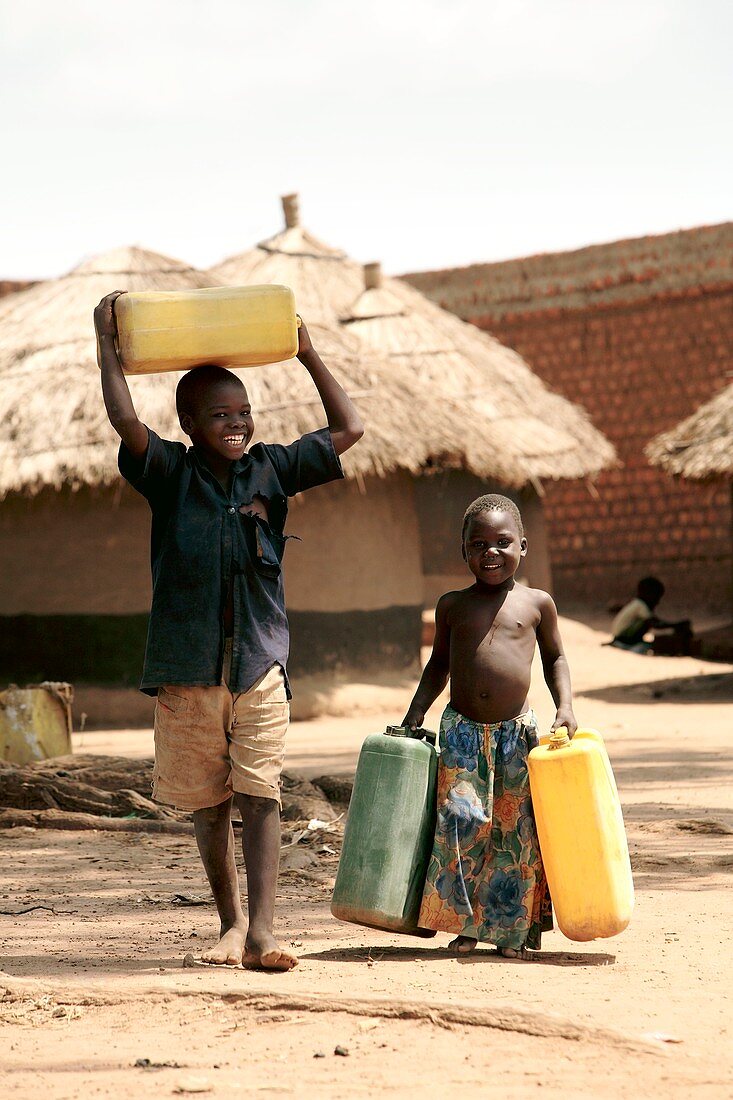 Children carrying water,Uganda