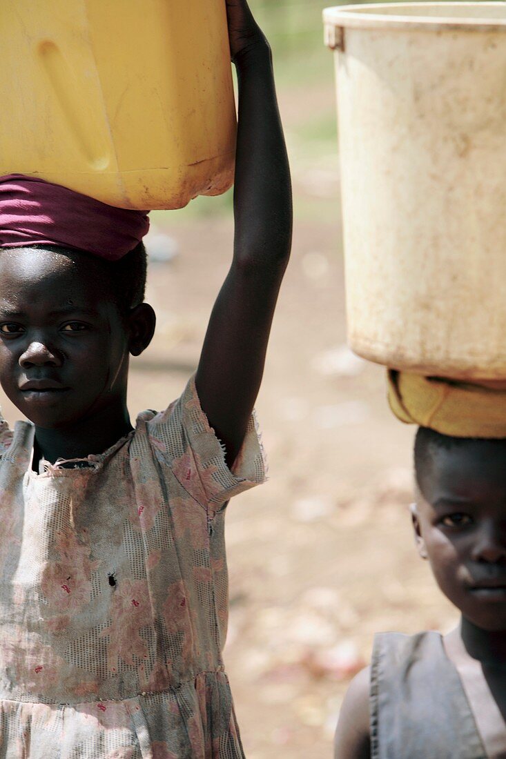 Children carrying water,Uganda