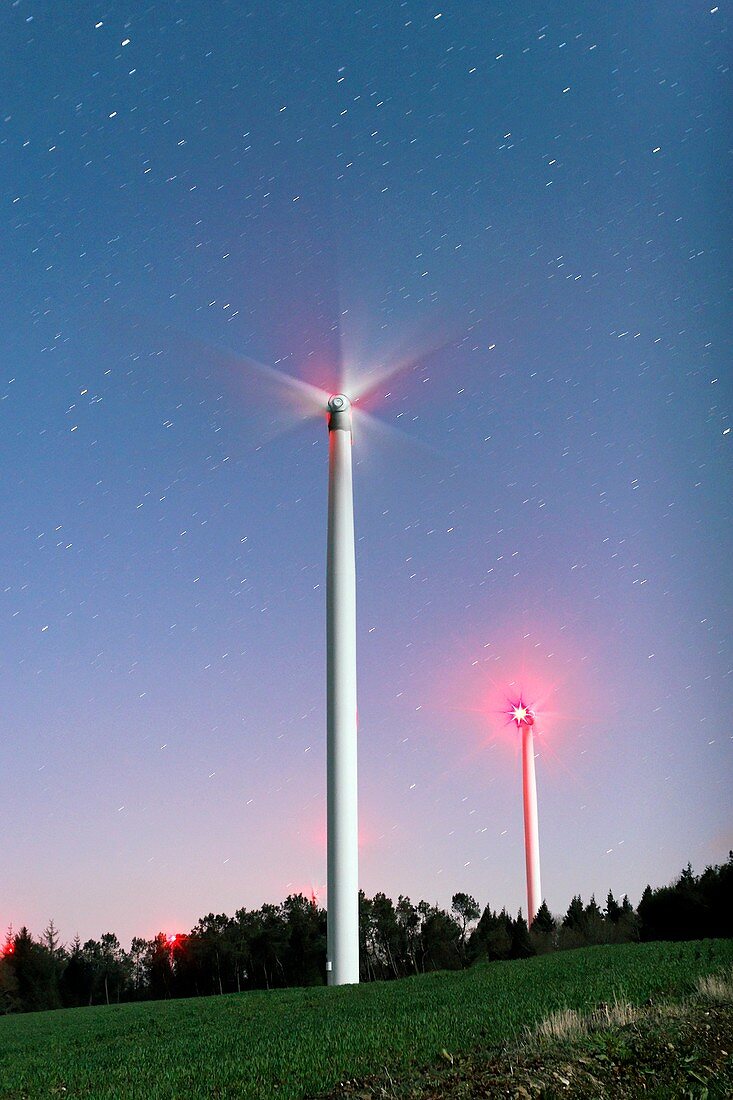 Wind turbines under stars