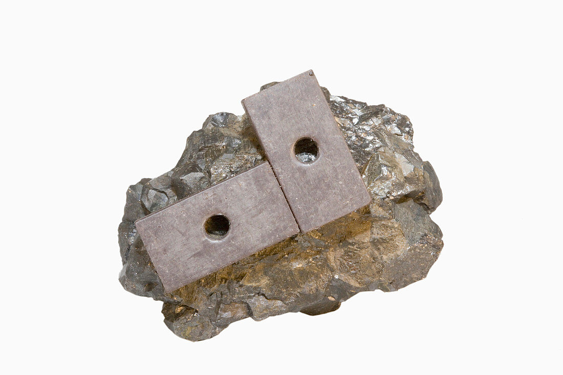 Lodestone with attracted iron
