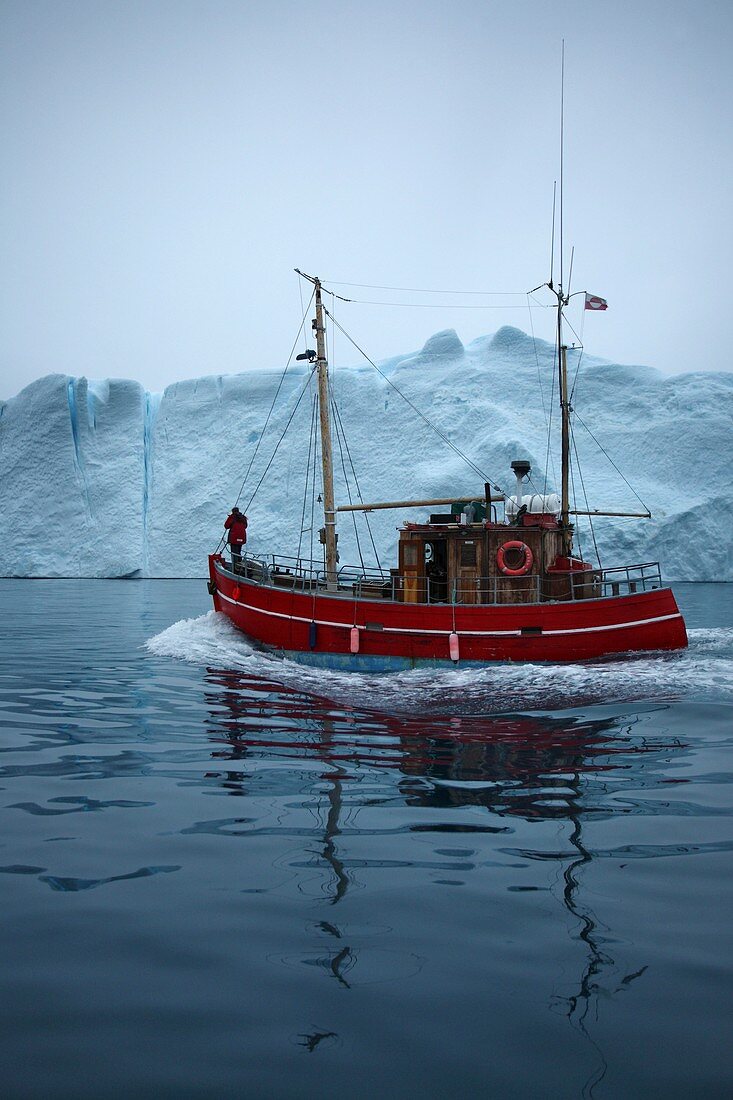 Fishing boat and iceberg