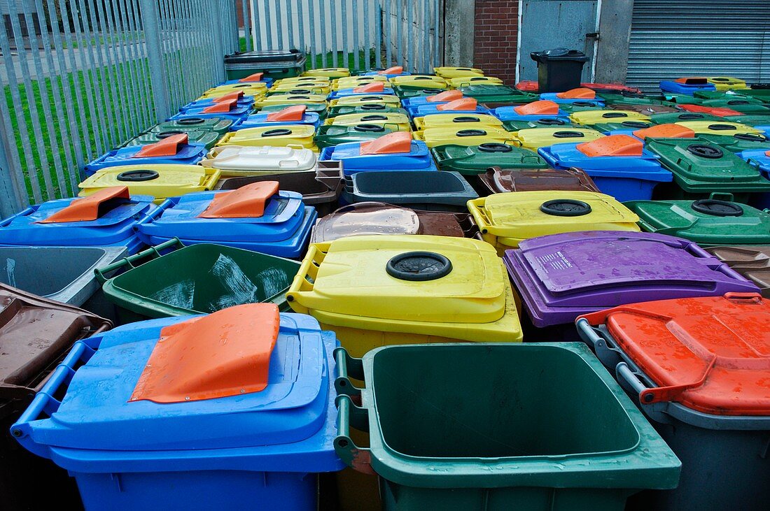Used and damaged wheelie bins in compound