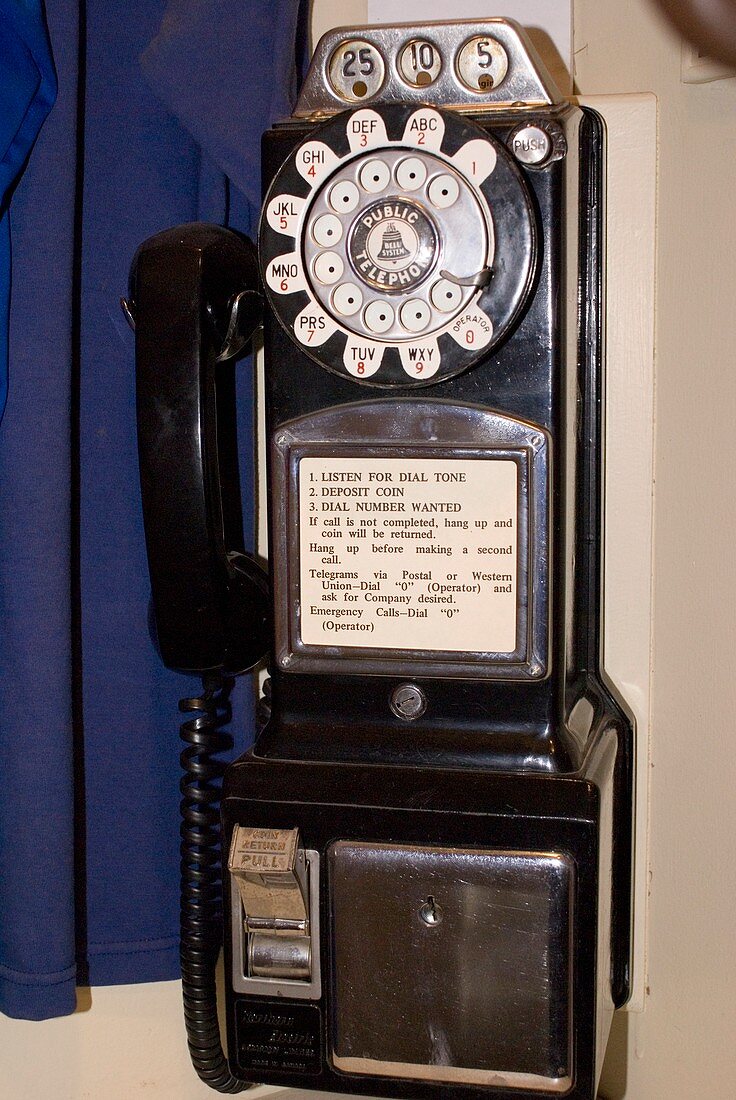 Rotary-dial telephone with coinbox