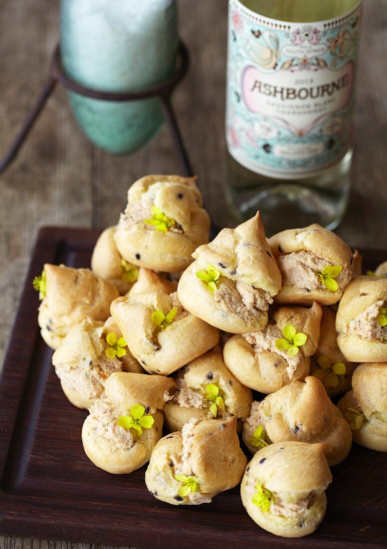 Spicy profiteroles filled with fish cream