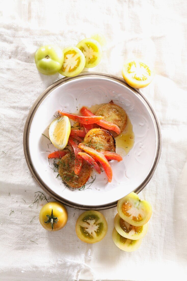 Fried tomatoes with smoked trout