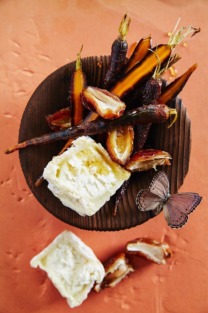 Purple carrots with dates and goat's cheese
