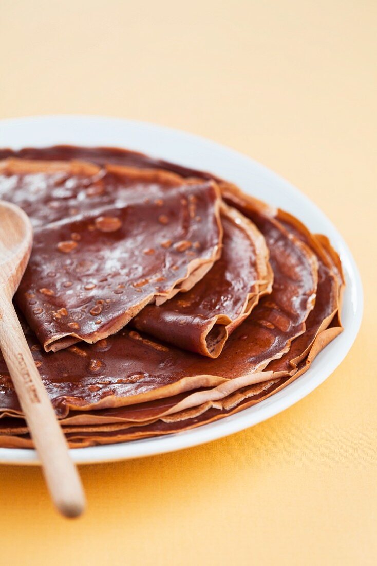 A stack of chocolate crepes