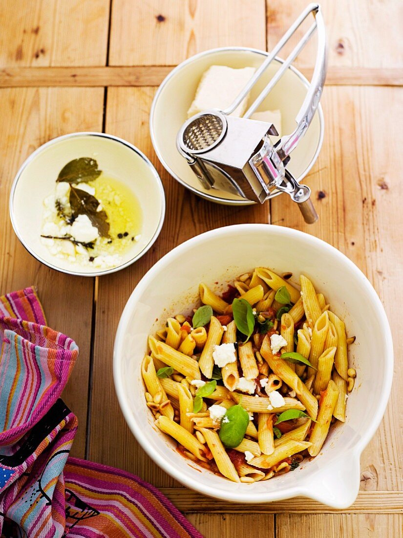 Penne pasta with goat's cheese and herbs