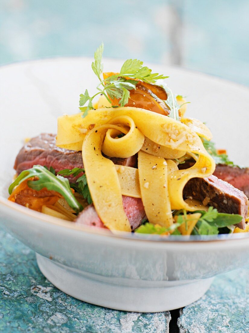 Beef salad with fresh tagliatelle and chilli