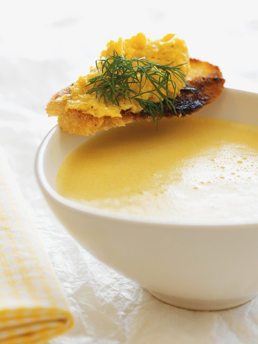 Cream of sweetcorn soup with a scrambled egg crostino