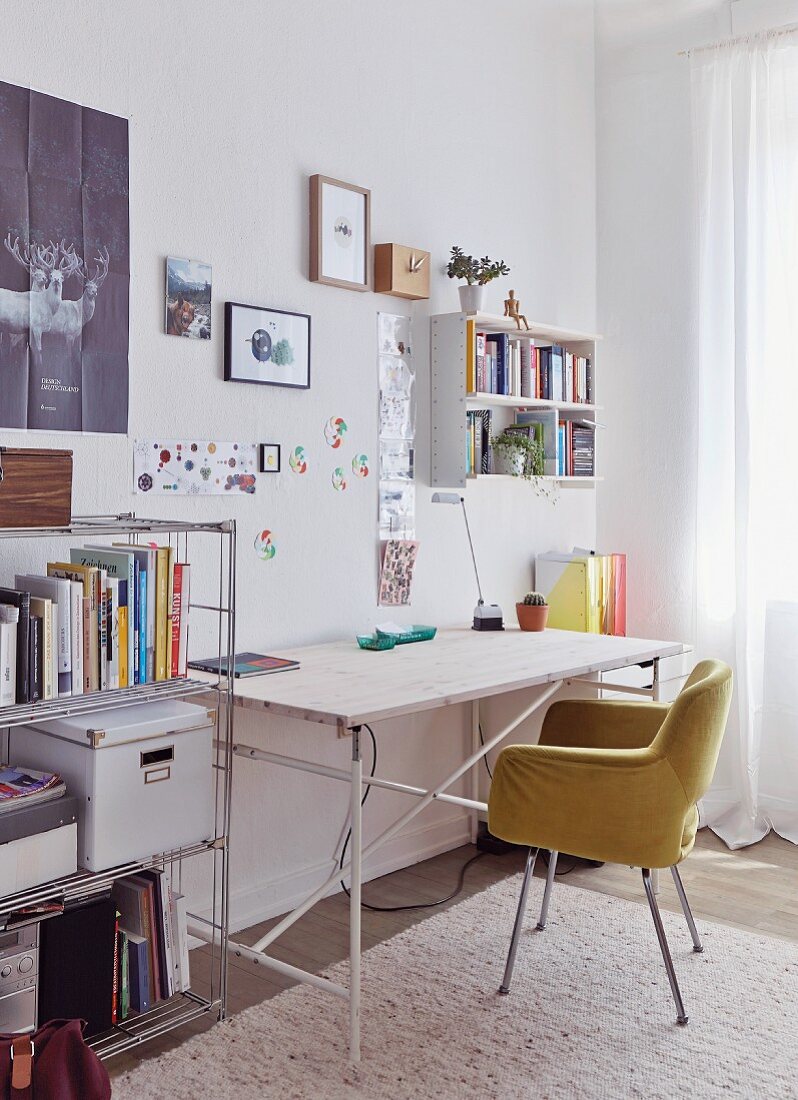 Upholstered shell chair at desk in contemporary study