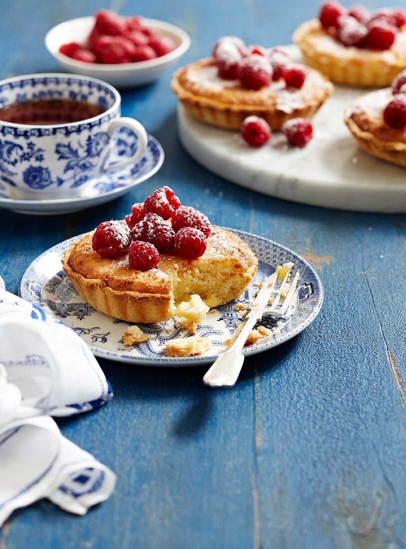 Coconut tartlets with raspberries