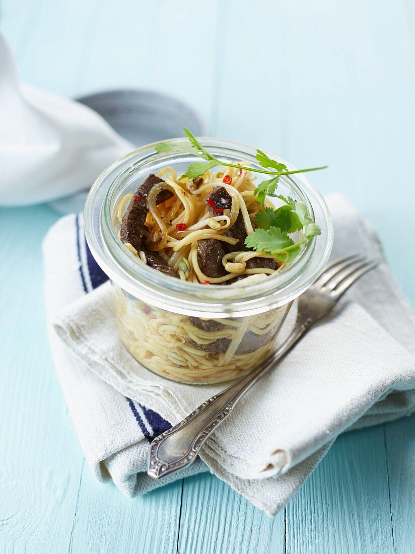 Spaghettini with beef and chilli peppers