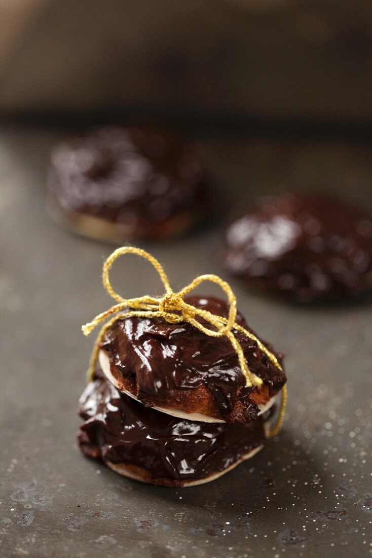 Chocolate and ginger biscuits tied with a ribbon